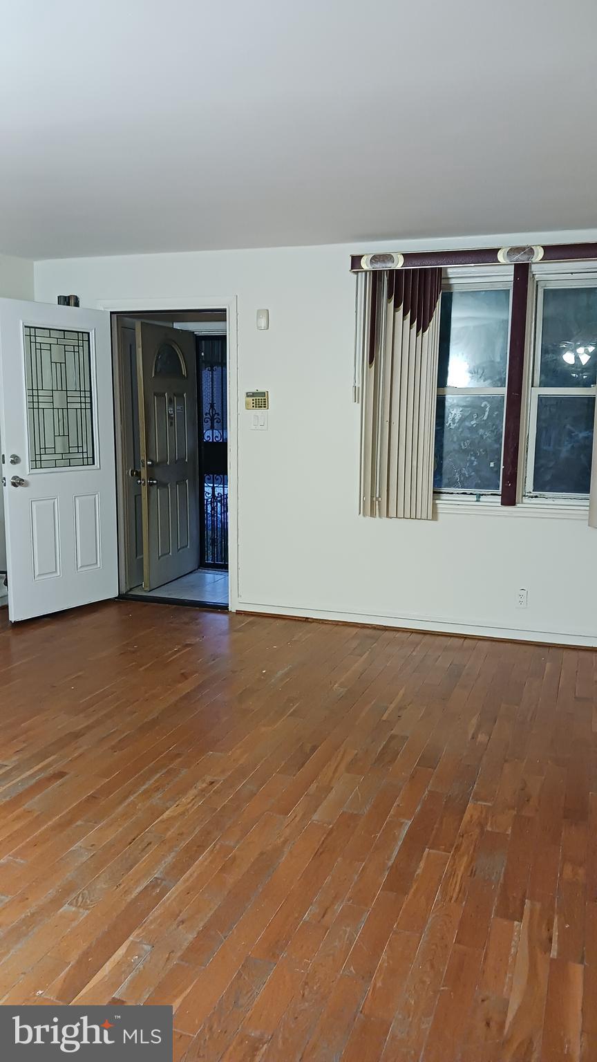 7239 Hanford Street Philadelphia, PA 19149 - Photo 15 of 16 a view of wooden floor and stairs in a room