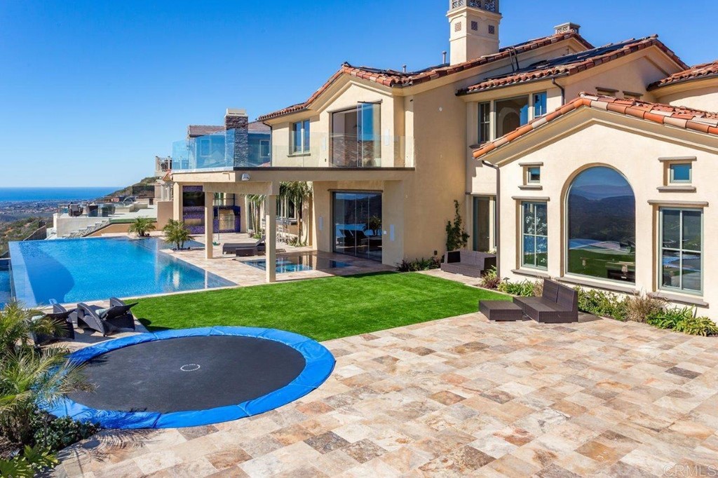 937 Pearl Drive San Marcos, CA 92078 - Photo 13 of 54 a view of a house with a backyard