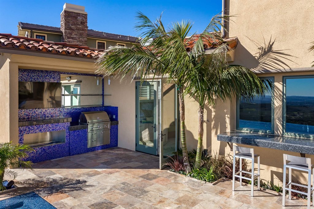 937 Pearl Drive San Marcos, CA 92078 - Photo 15 of 54 a view of a house with a patio