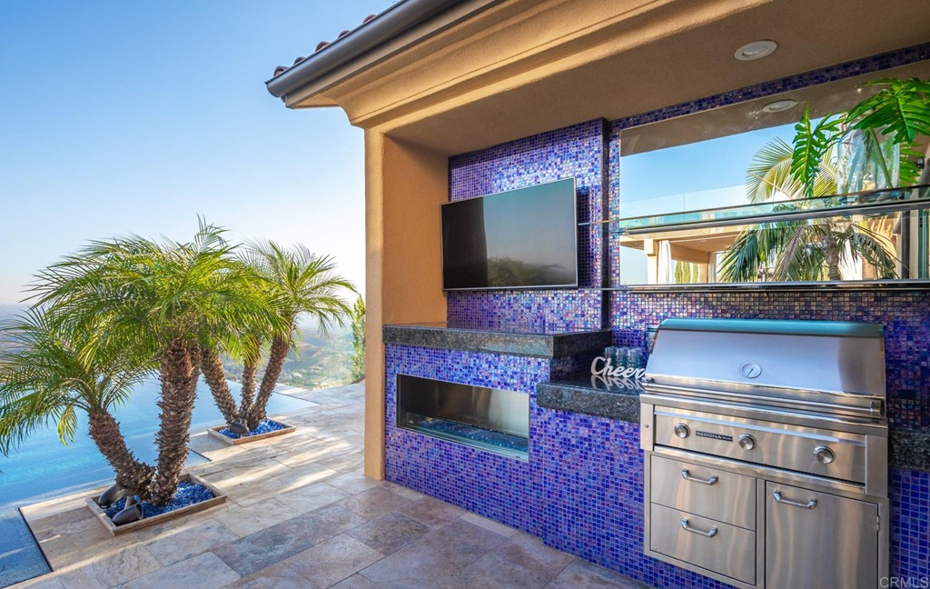 937 Pearl Drive San Marcos, CA 92078 - Photo 18 of 54 a kitchen with a stove and a microwave