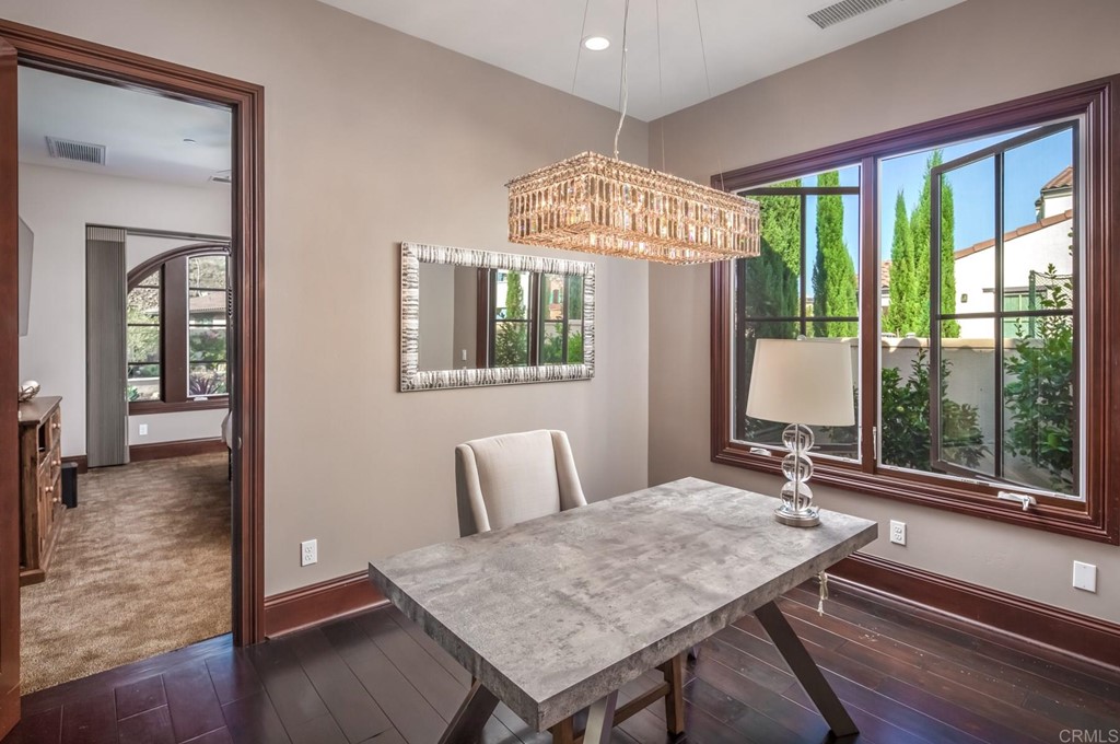 937 Pearl Drive San Marcos, CA 92078 - Photo 38 of 54 a view of a dining room with furniture window and wooden floor