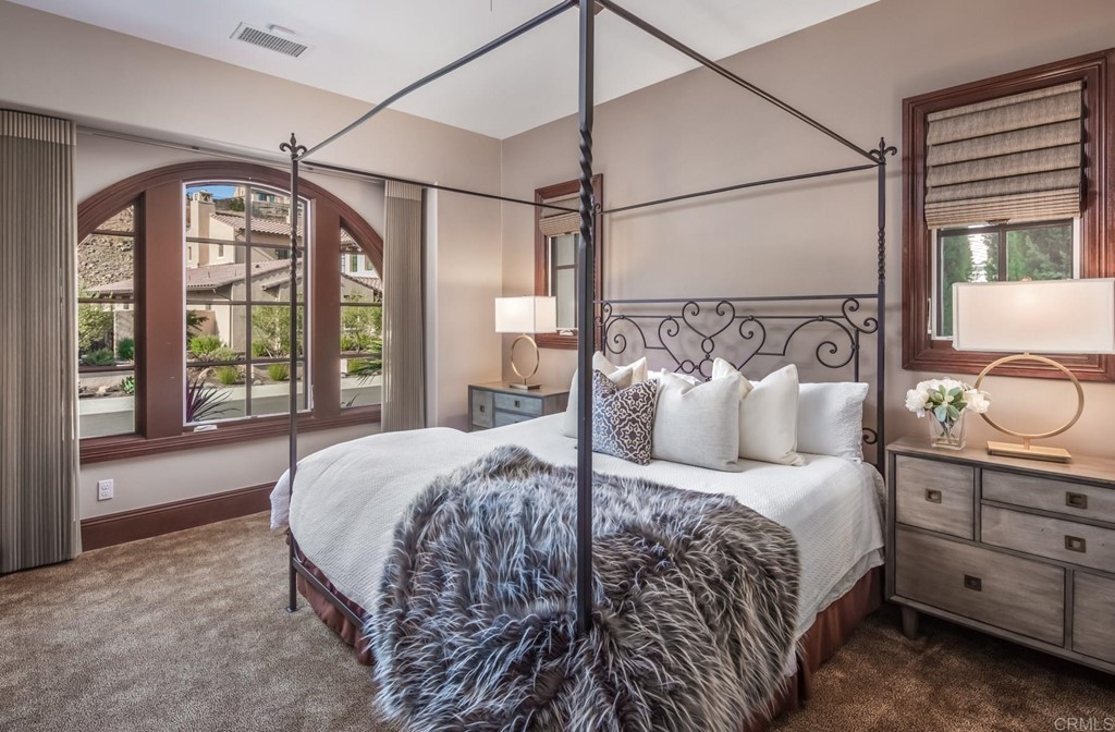 937 Pearl Drive San Marcos, CA 92078 - Photo 39 of 54 a bedroom with a large bed and a window