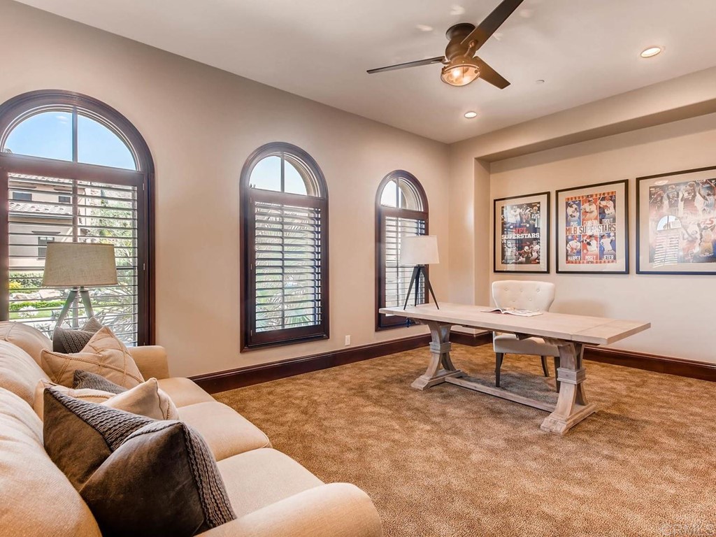 937 Pearl Drive San Marcos, CA 92078 - Photo 41 of 54 a living room with furniture a window and a chandelier