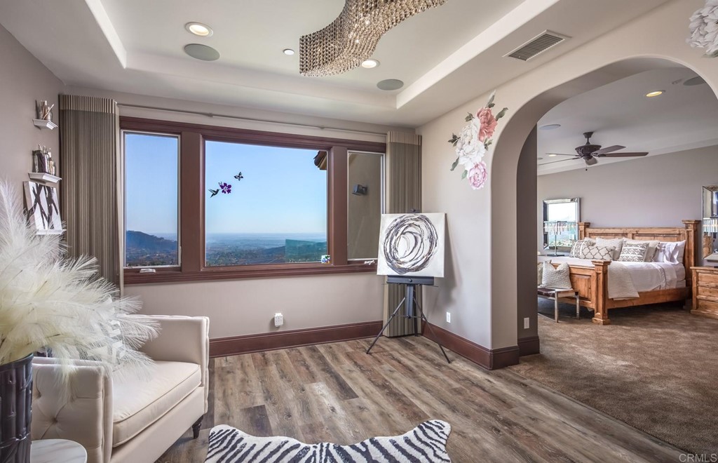 937 Pearl Drive San Marcos, CA 92078 - Photo 45 of 54 a living room with a couch and a table with wooden floor