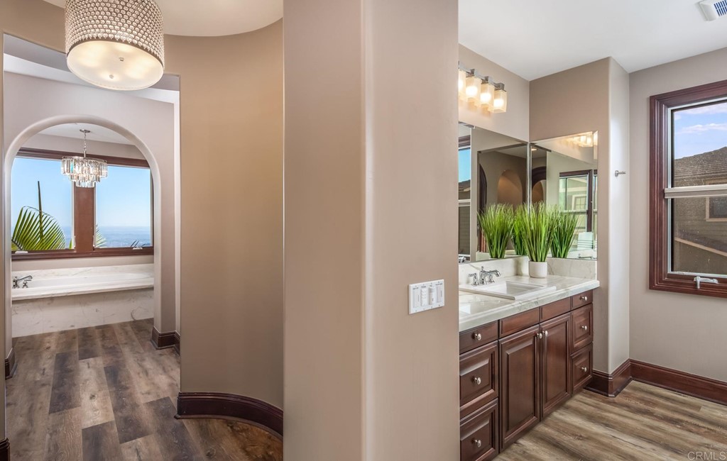 937 Pearl Drive San Marcos, CA 92078 - Photo 49 of 54 a bathroom with a sink and a mirror
