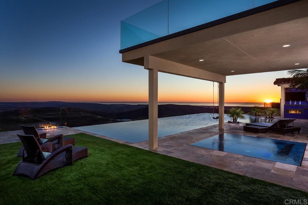 937 Pearl Drive San Marcos, CA 92078 - Photo 8 of 54 a view of a swimming pool with a patio