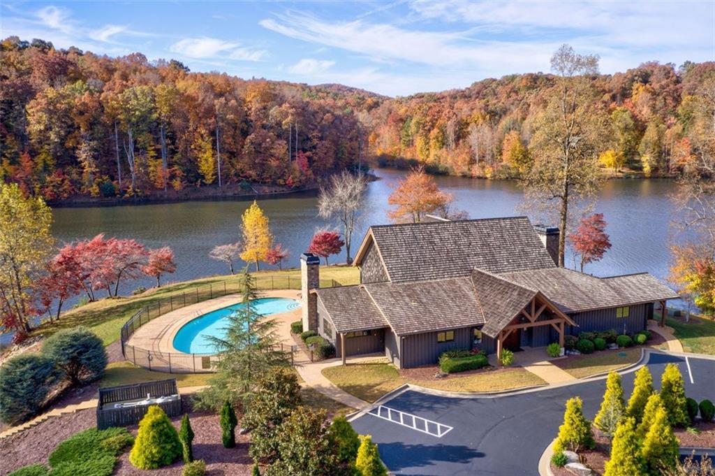 228 Stone Clf Trace Cleveland, GA 30528 - Photo 19 of 41 an aerial view of a house with swimming pool and lake view