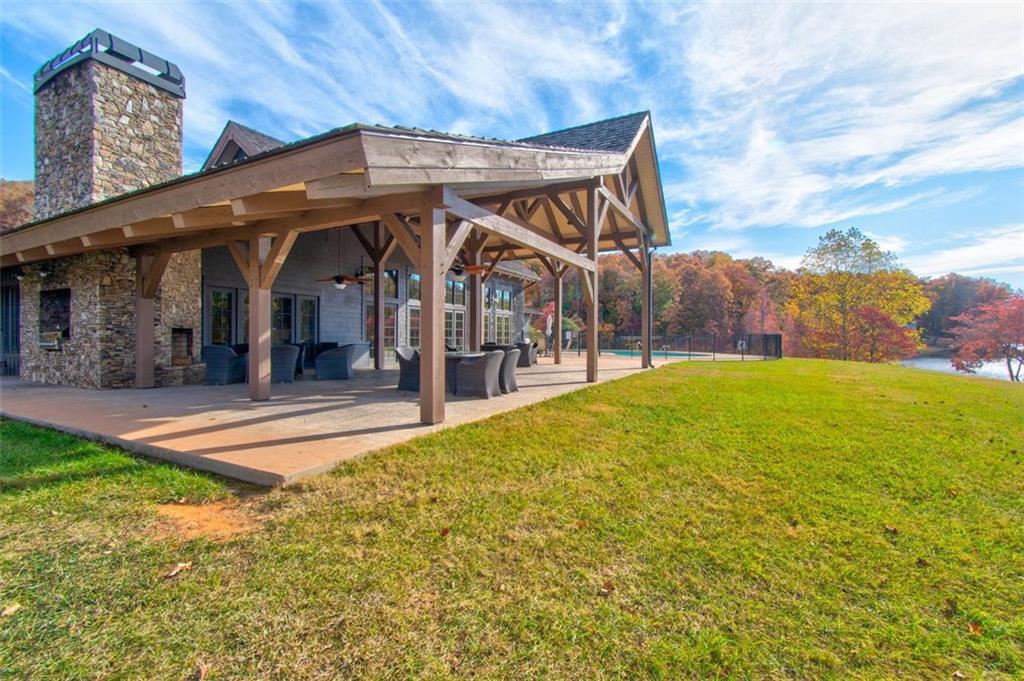 228 Stone Clf Trace Cleveland, GA 30528 - Photo 21 of 41 a view of a house with a swimming pool