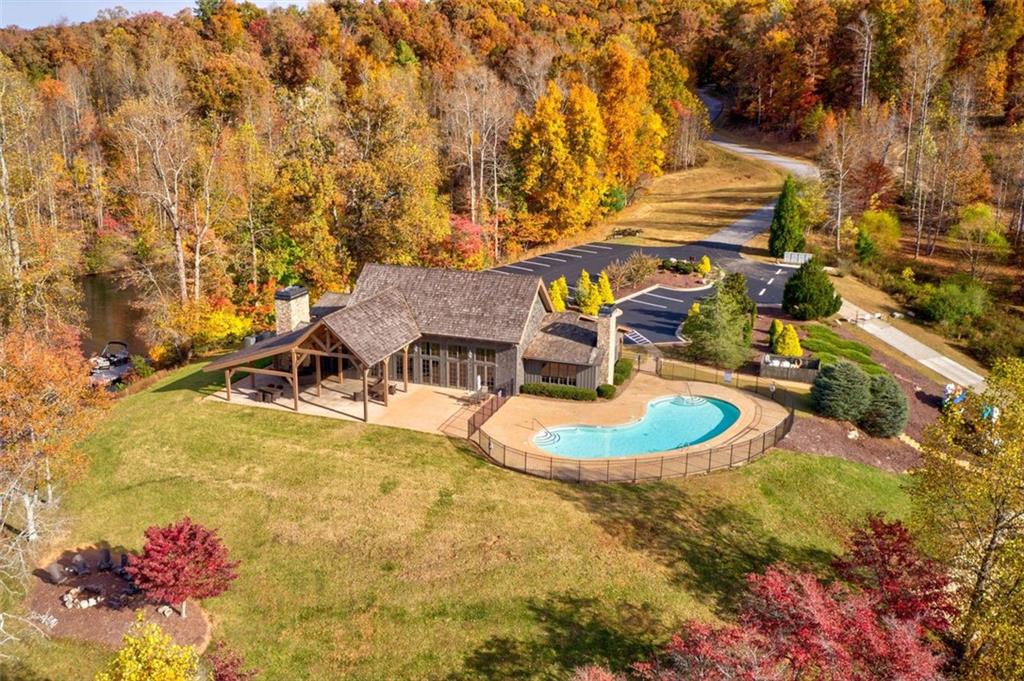 228 Stone Clf Trace Cleveland, GA 30528 - Photo 24 of 41 a view of a swimming pool with a yard