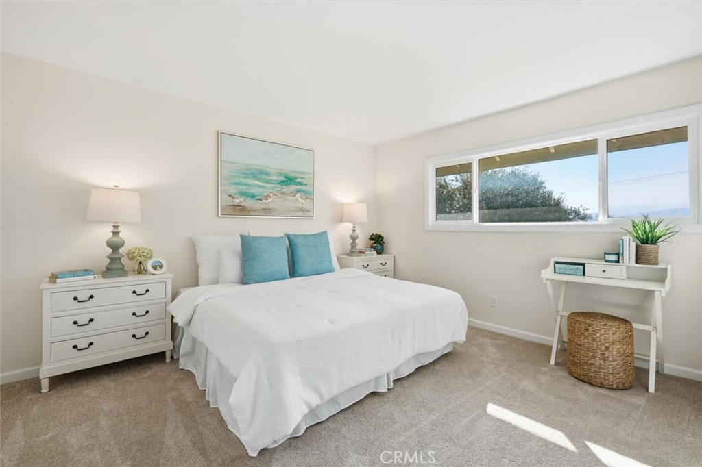 23005 Nadine Circle, Unit B Torrance, CA 90505 - Photo 13 of 29 a bedroom with a bed and a window