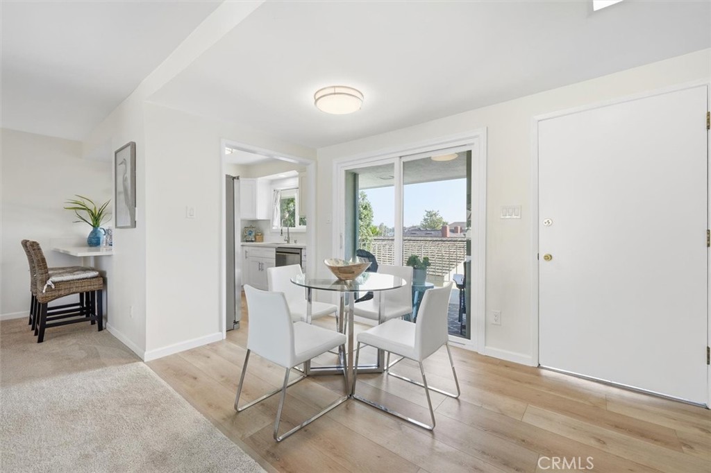 23005 Nadine Circle, Unit B Torrance, CA 90505 - Photo 10 of 29 a dining room with furniture and window