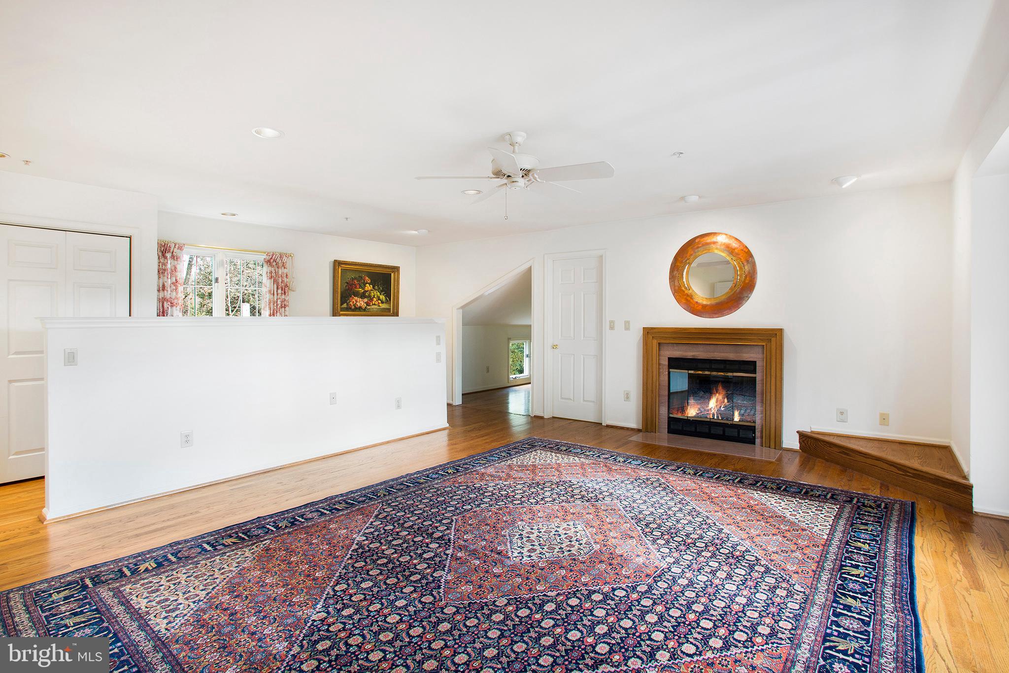 36 Clwyd Road Bala Cynwyd, PA 19004 - Photo 12 of 28 a view of an empty room with a fireplace and a rug
