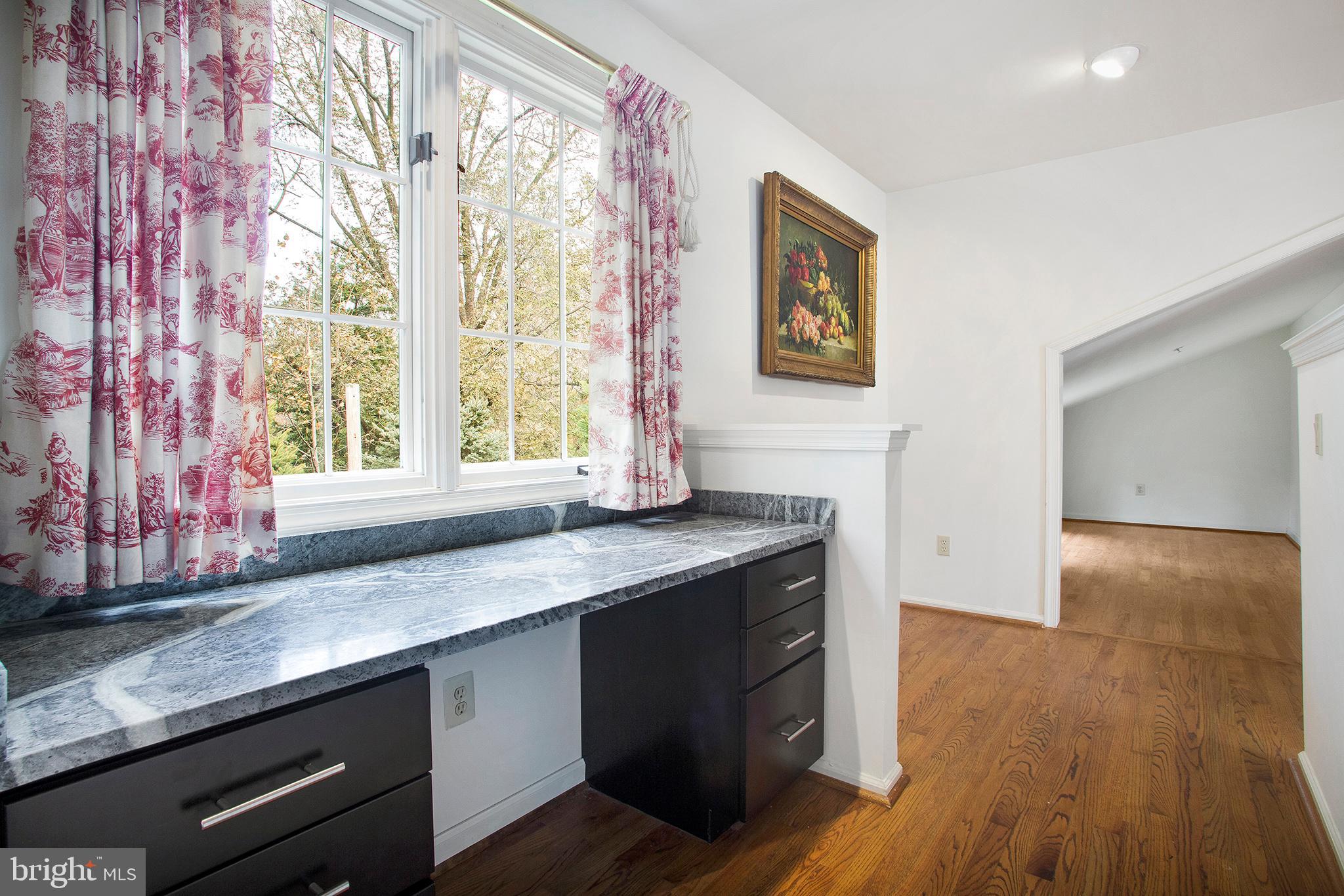 36 Clwyd Road Bala Cynwyd, PA 19004 - Photo 13 of 28 a kitchen with stainless steel appliances granite countertop a sink a stove and wooden floors