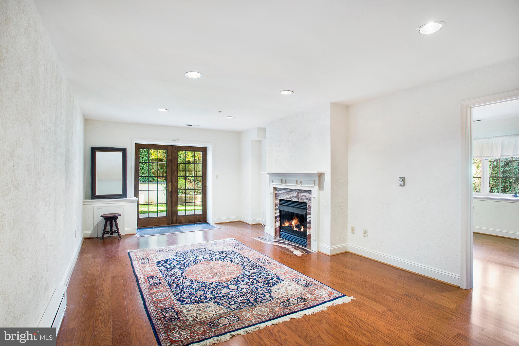 36 Clwyd Road Bala Cynwyd, PA 19004 - Photo 24 of 28 a living room with furniture and a fireplace