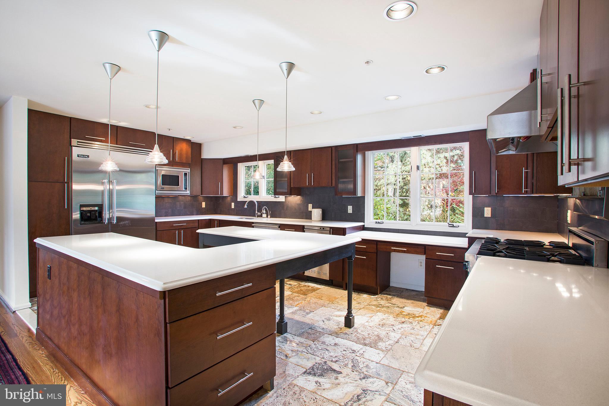 36 Clwyd Road Bala Cynwyd, PA 19004 - Photo 5 of 28 a kitchen with a stove sink and cabinets