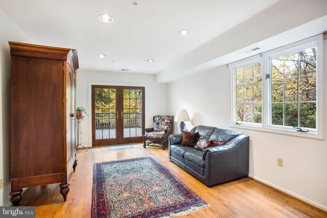 a view of balcony with wooden floor