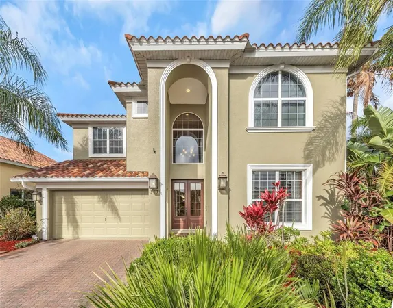a front view of a house with lots of yellow lighting
