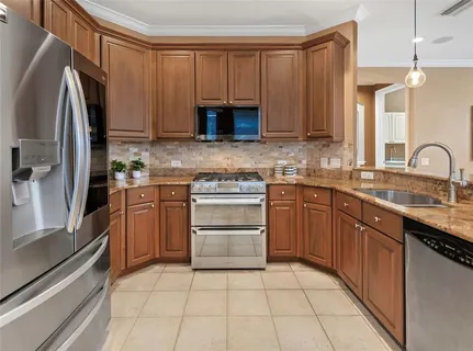 a view of hallway with wooden floor
