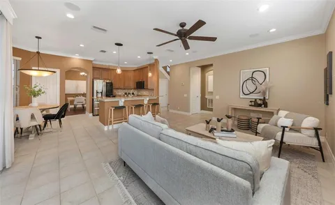 a bathroom with a granite countertop bathtub shower and sink