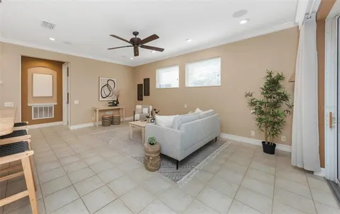 a bathroom with a tub a sink and mirror