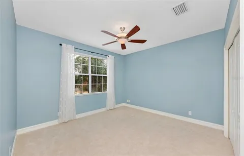 a view of a lake with a yard