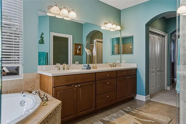 a front view of a house with plants