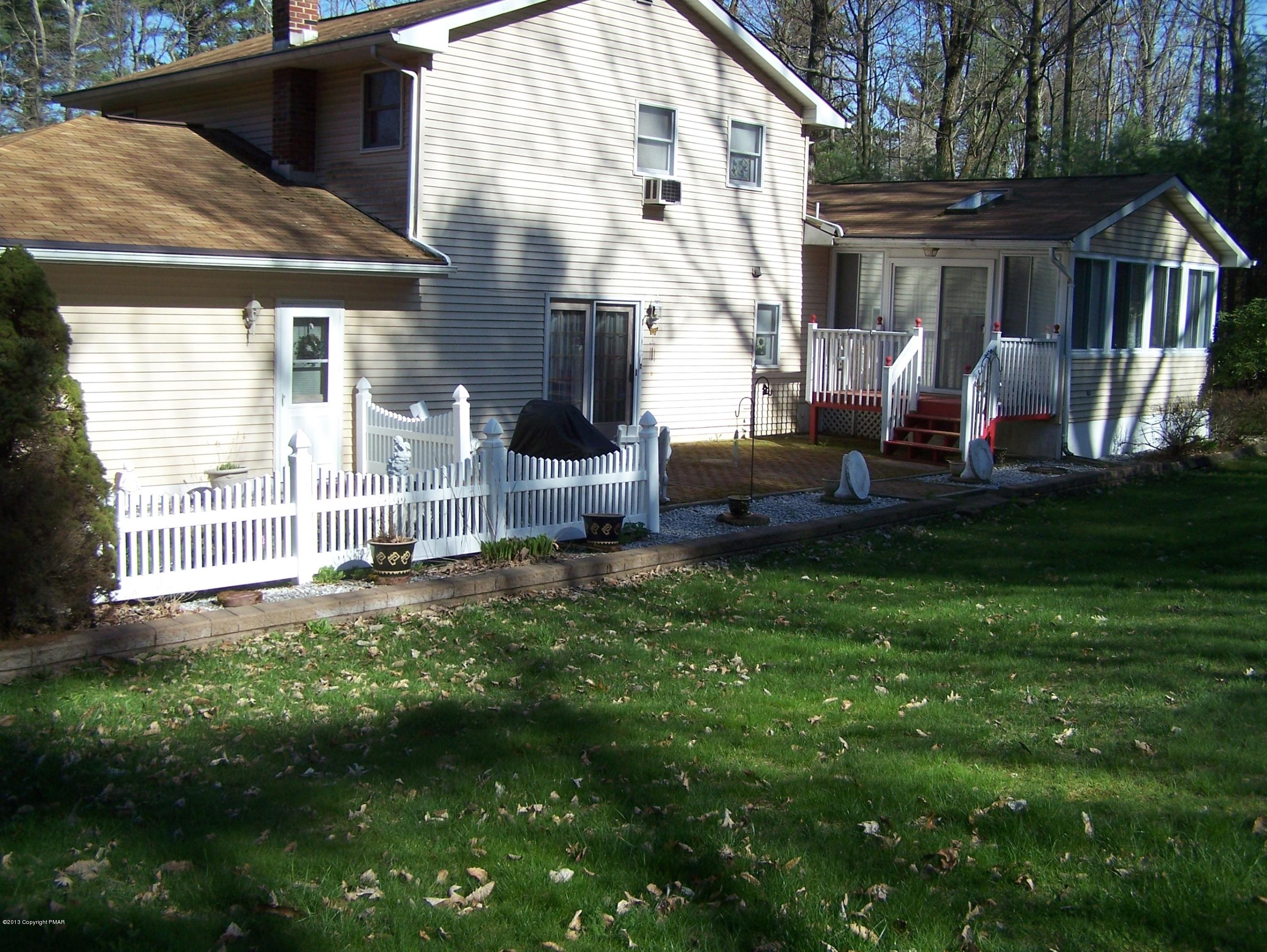 557 Long Mountain Road Effort, PA 18330 - Photo 7 of 45 a front view of house with yard