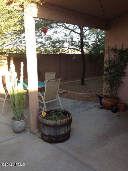 4132 East Chambers Street Phoenix, AZ 85040 - Photo 15 of 16 a view of a porch with furniture and a potted plant