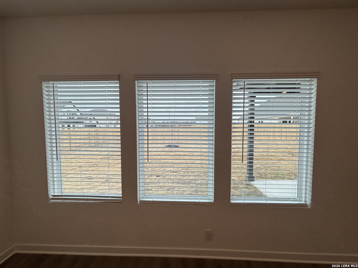 10101 Peppercorn Place Schertz, TX 78154 - Photo 13 of 36 a view of an empty room with a window