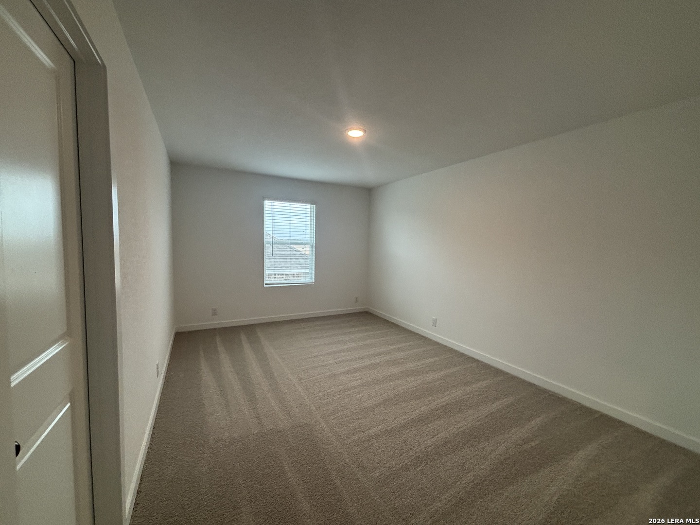 10101 Peppercorn Place Schertz, TX 78154 - Photo 24 of 36 an empty room with a window