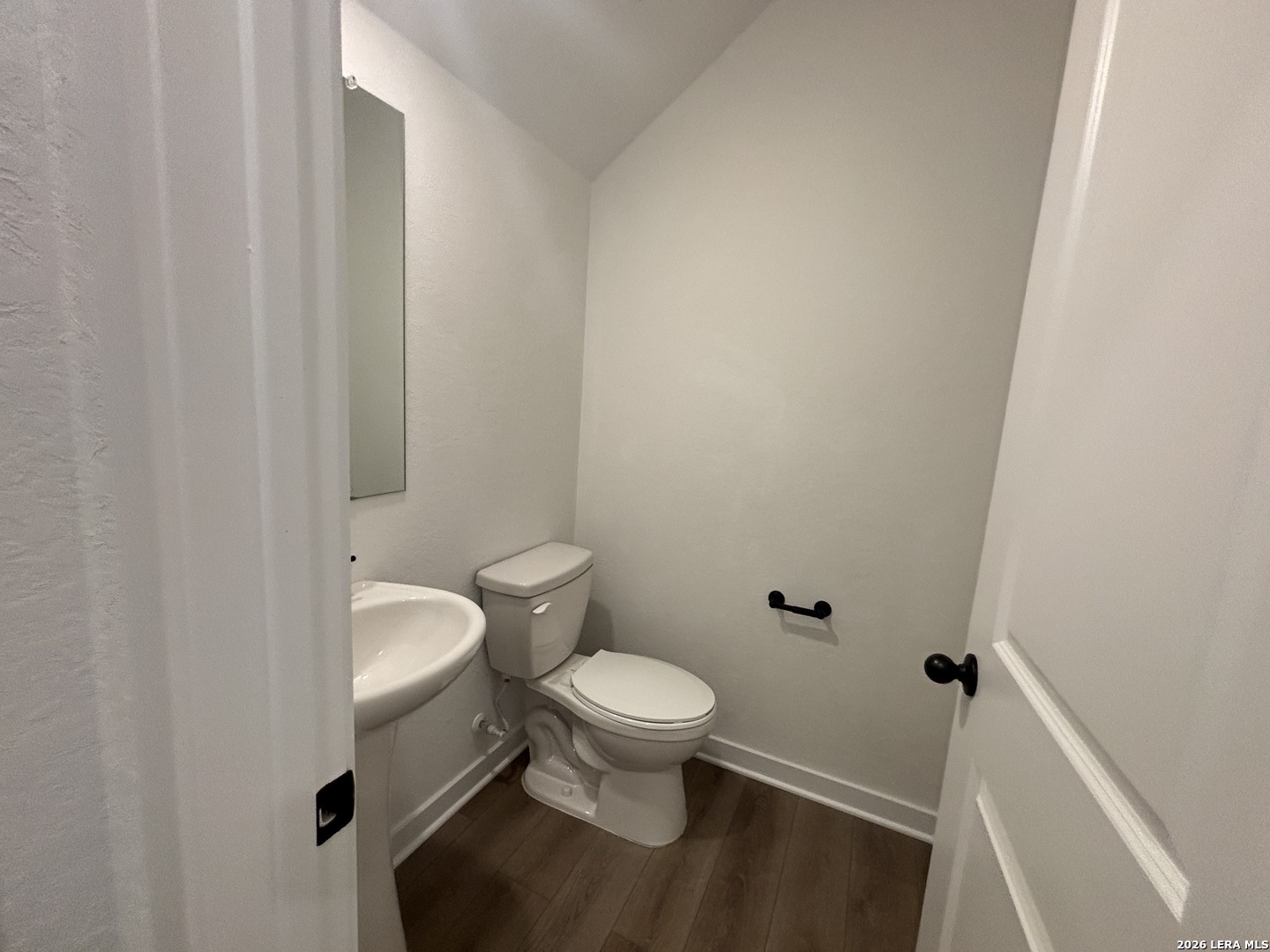 10101 Peppercorn Place Schertz, TX 78154 - Photo 30 of 36 a white toilet sitting next to a small bathroom