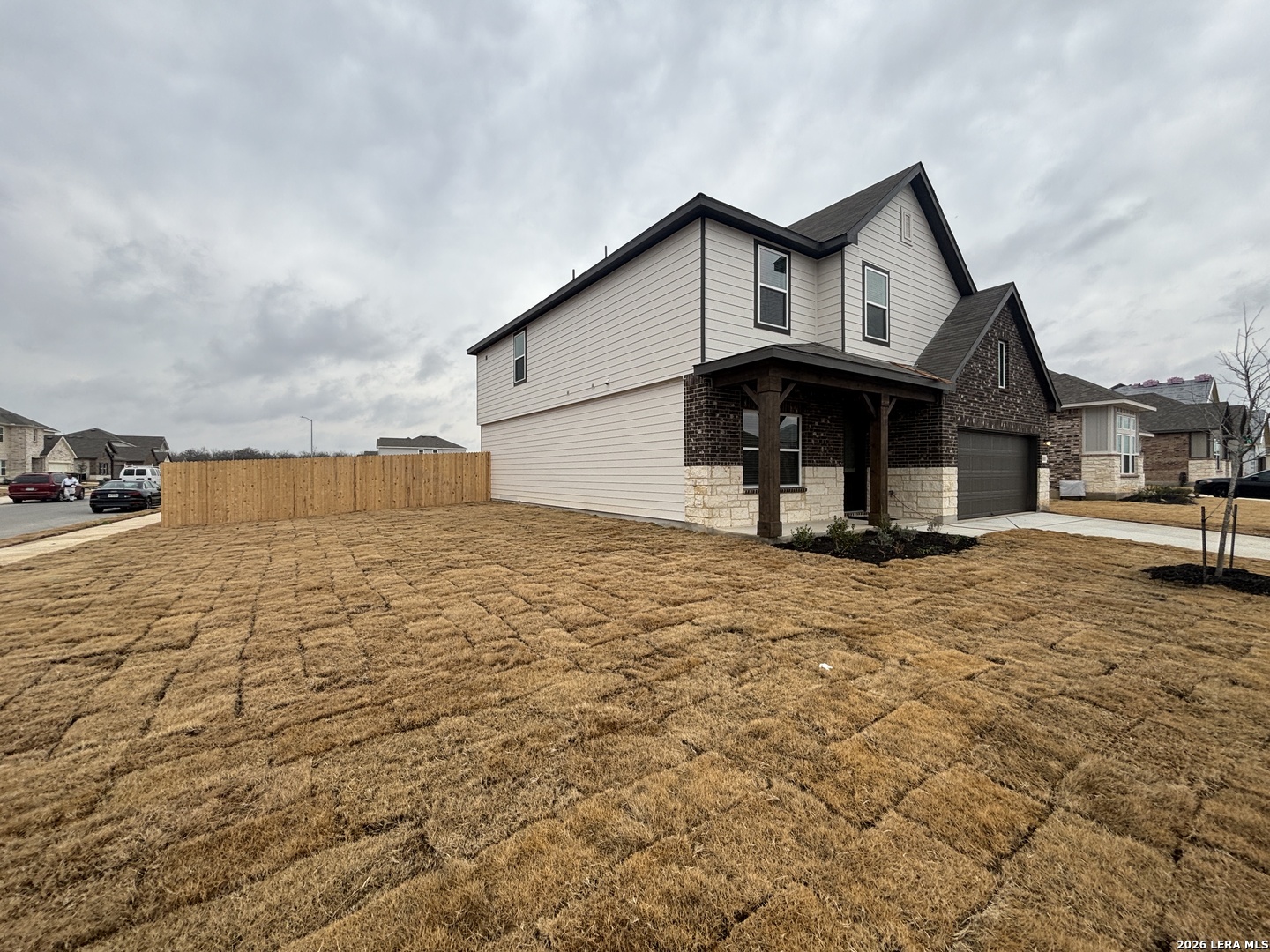 10101 Peppercorn Place Schertz, TX 78154 - Photo 5 of 36 a view of a house with wooden fence