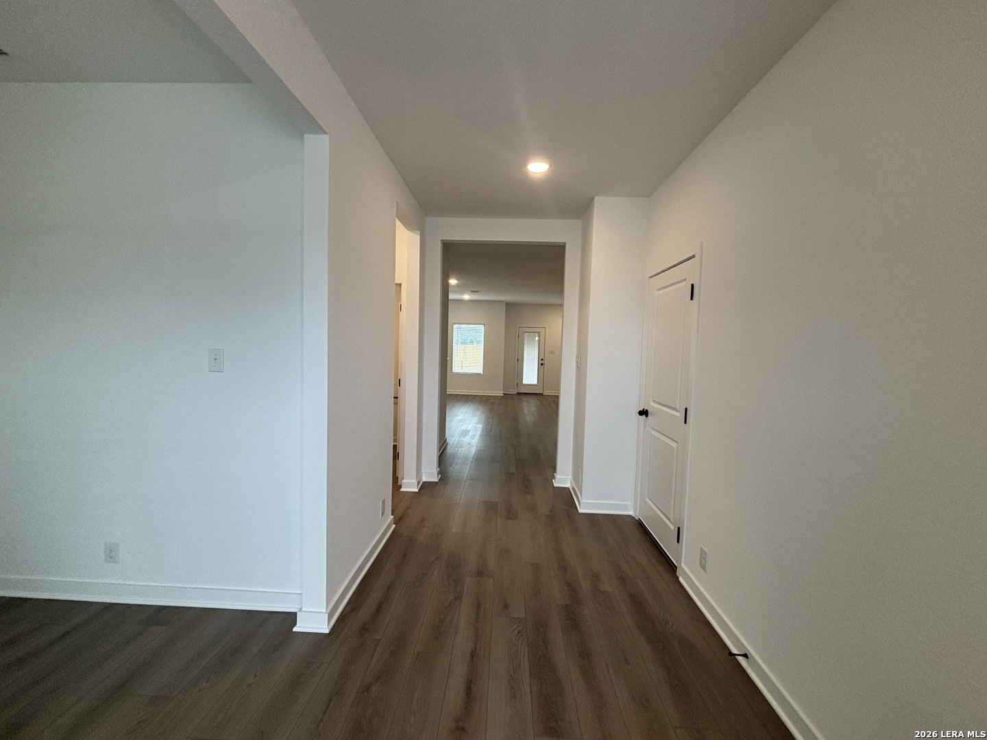 10101 Peppercorn Place Schertz, TX 78154 - Photo 7 of 36 a view of a hallway with wooden floor