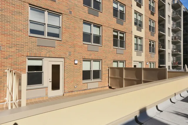 a workspace with furniture and window