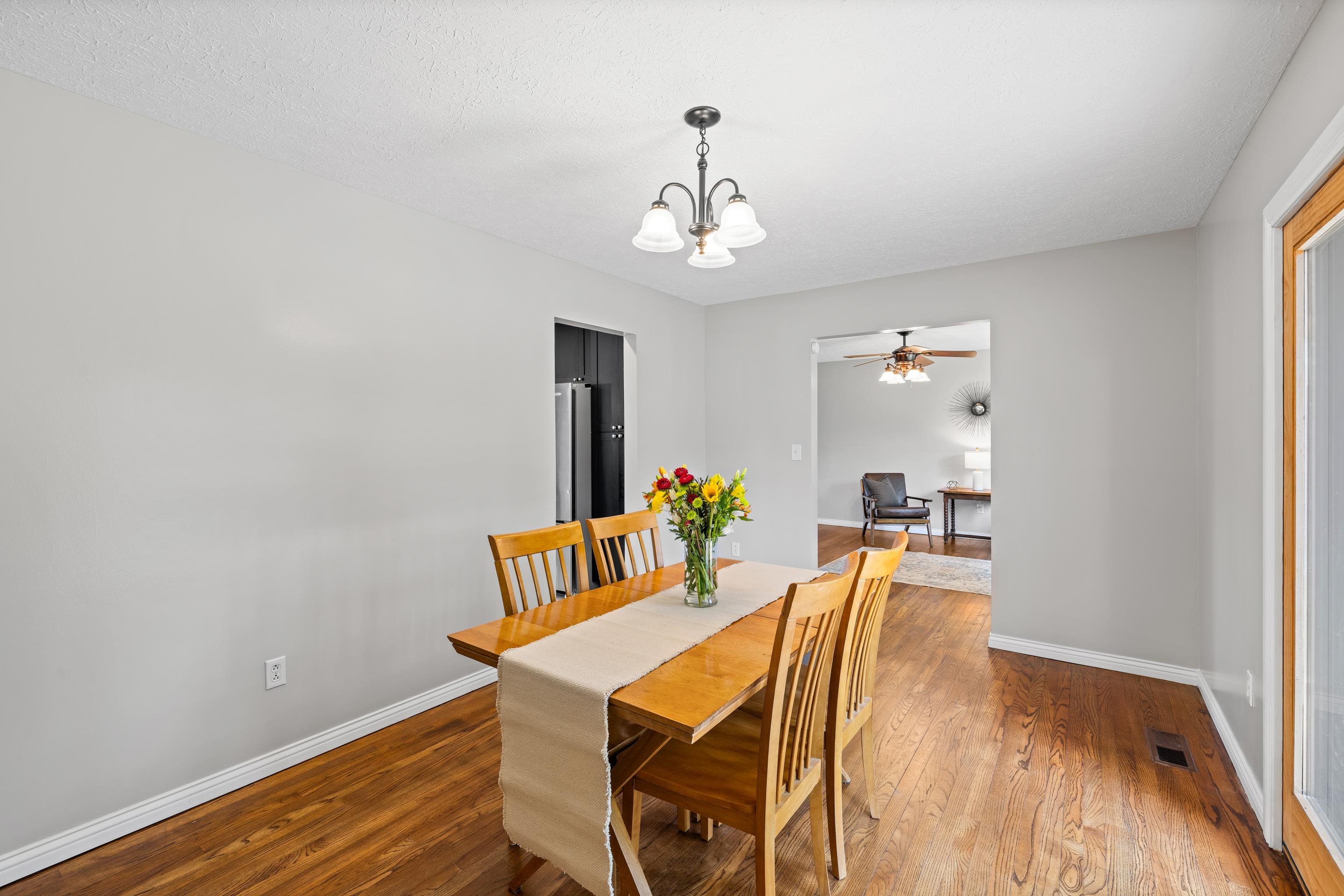 249 Cattle Scales Road Waynesboro, VA 22980 - Photo 16 of 50 a view of a dining room with furniture and wooden floor