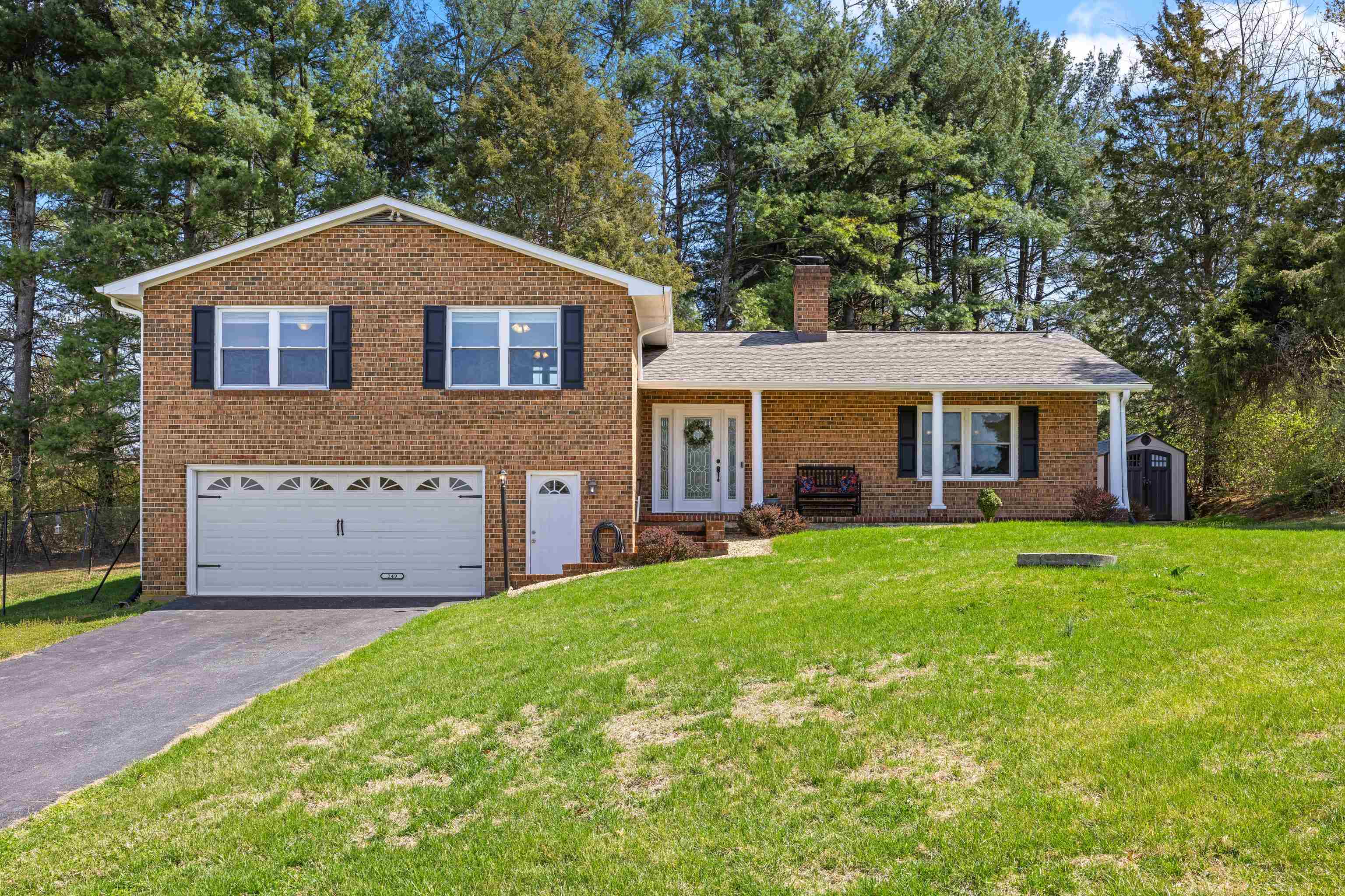 249 Cattle Scales Road Waynesboro, VA 22980 - Photo 2 of 50 a front view of a house with a yard and garage
