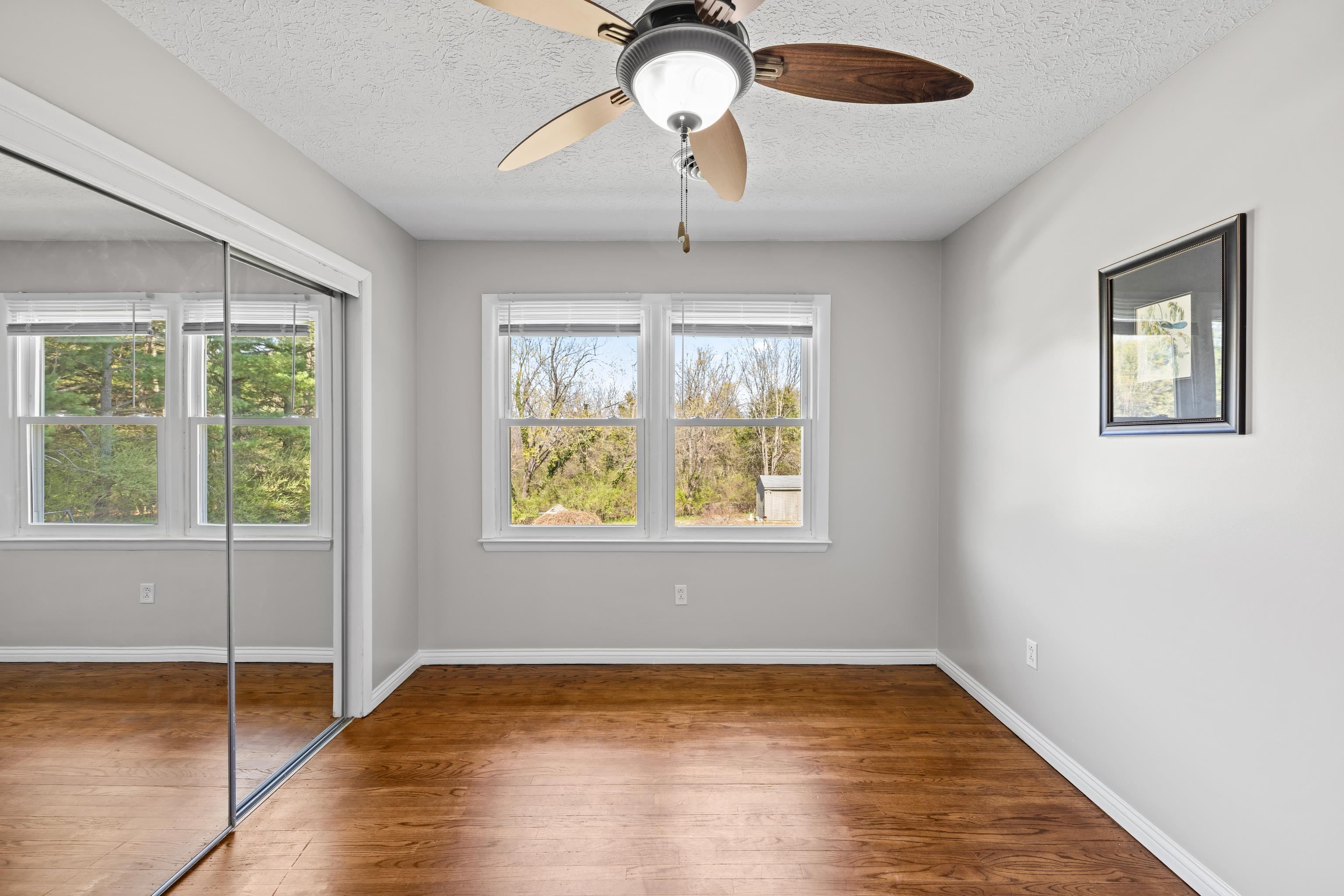 249 Cattle Scales Road Waynesboro, VA 22980 - Photo 29 of 50 a view of empty room with wooden floor and window