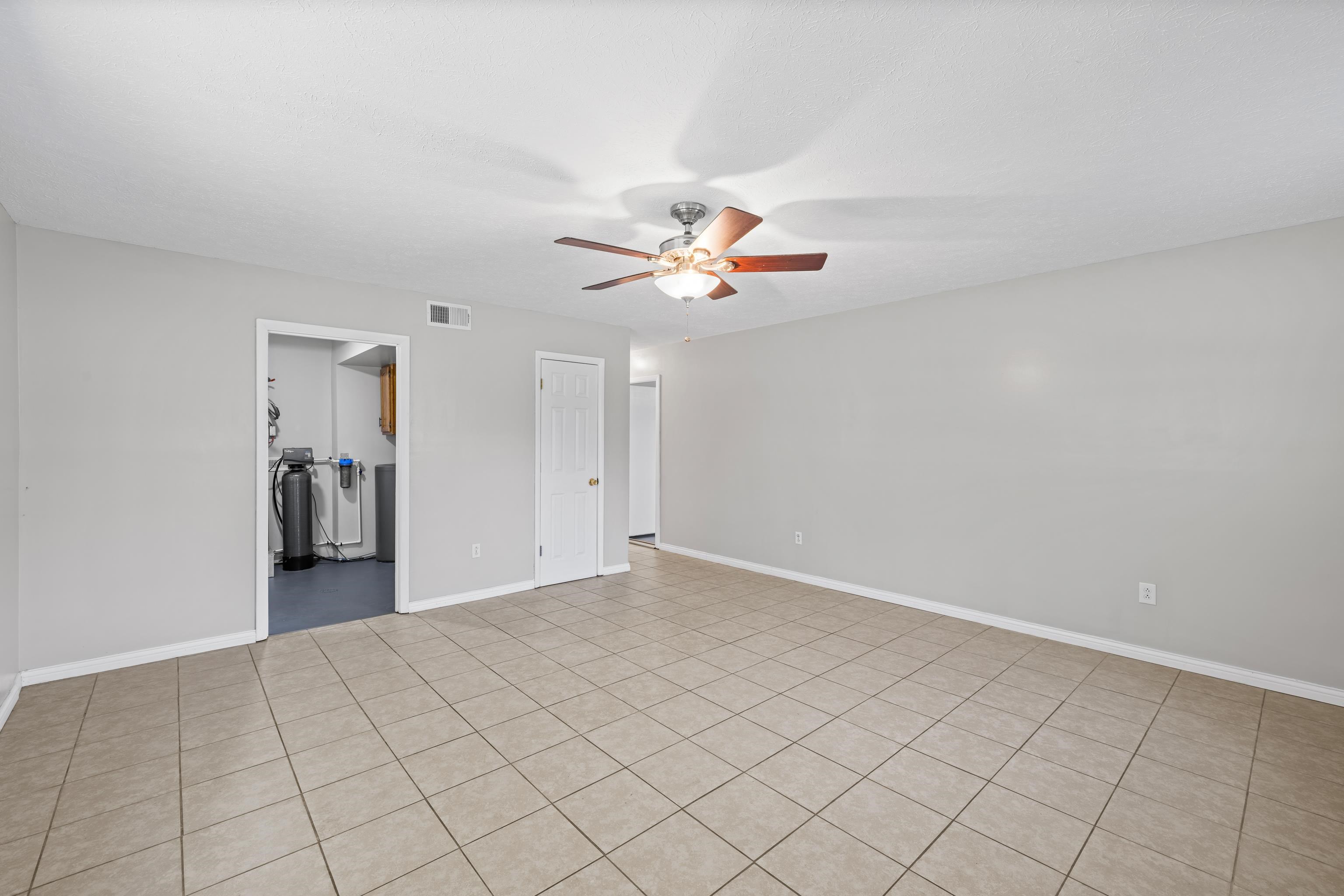 249 Cattle Scales Road Waynesboro, VA 22980 - Photo 36 of 50 a view of an empty room with chandelier fan
