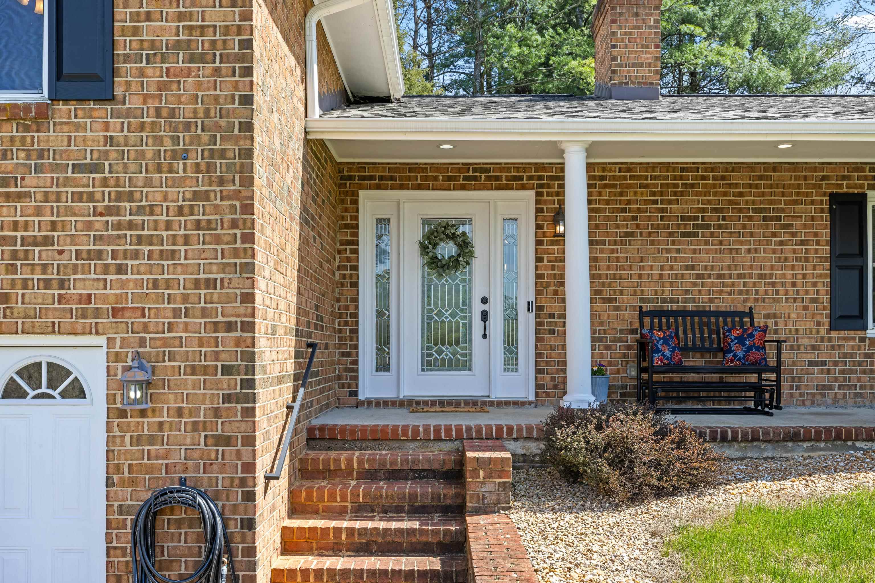 249 Cattle Scales Road Waynesboro, VA 22980 - Photo 5 of 50 a front view of a house with a garden