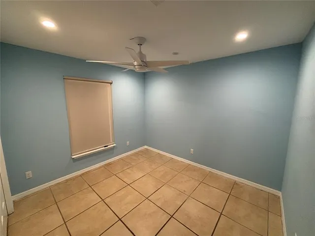 en empty room with windows