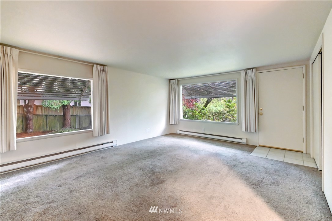 19722 13th Drive Southeast Bothell, WA 98012 - Photo 11 of 21 an empty room with windows