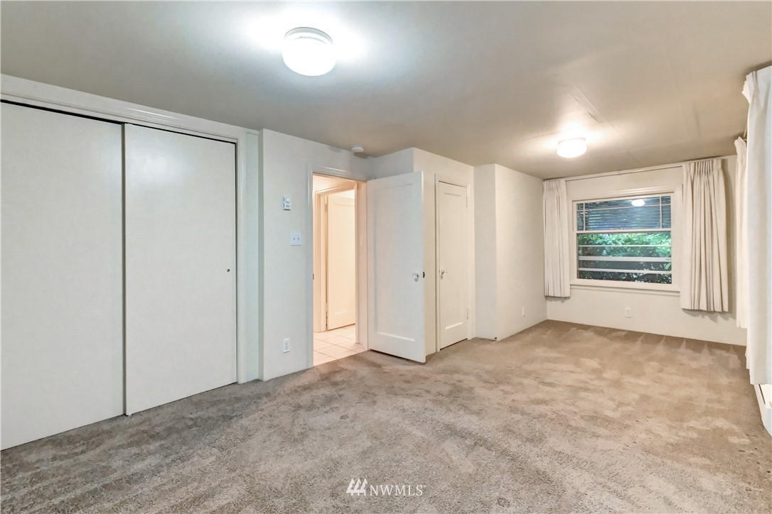 19722 13th Drive Southeast Bothell, WA 98012 - Photo 14 of 21 an empty room with windows and closet
