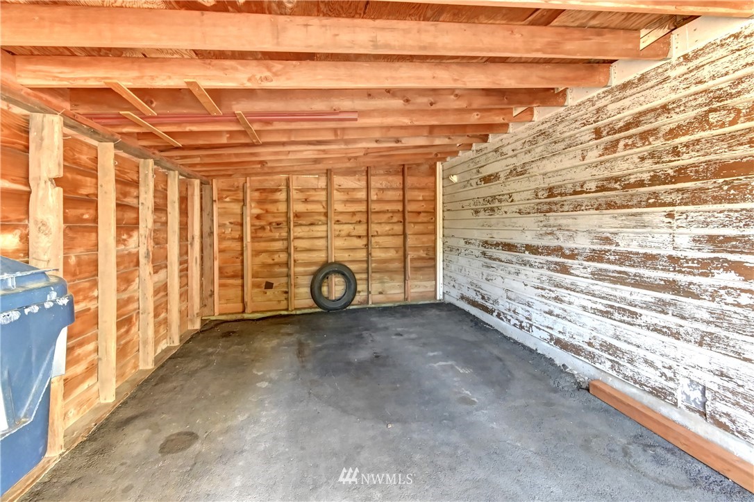 19722 13th Drive Southeast Bothell, WA 98012 - Photo 17 of 21 a view of a garage with wooden walls