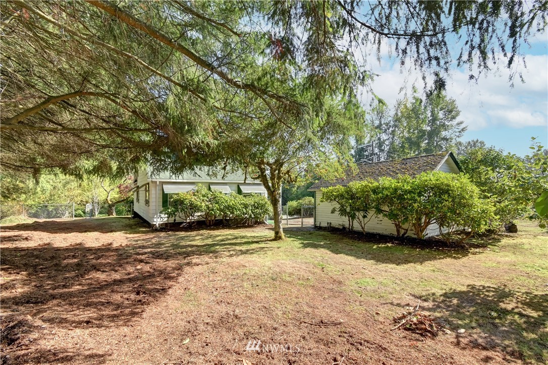 19722 13th Drive Southeast Bothell, WA 98012 - Photo 21 of 21 a view of a yard with plants and trees