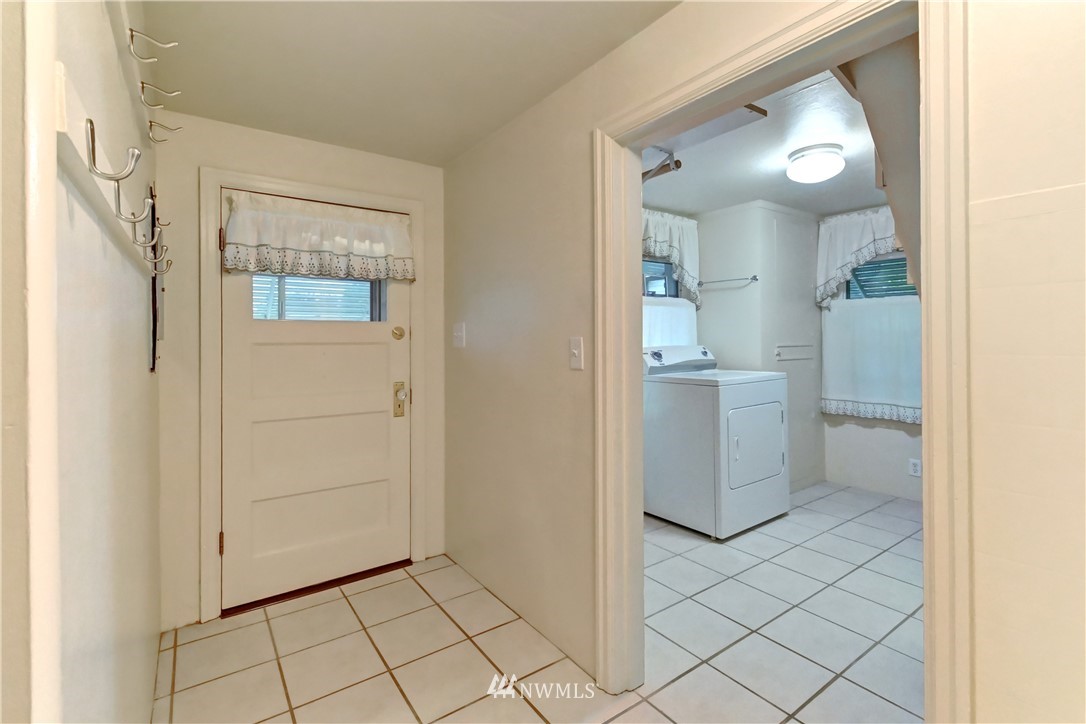 19722 13th Drive Southeast Bothell, WA 98012 - Photo 5 of 21 a view of a bathroom from the hallway