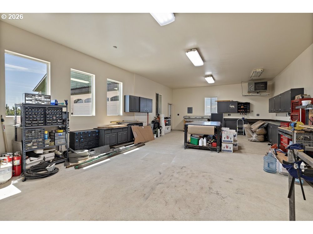 500 St Hilaire Road Yakima, WA 98901 - Photo 21 of 29 a view of a livingroom with furniture and a garage
