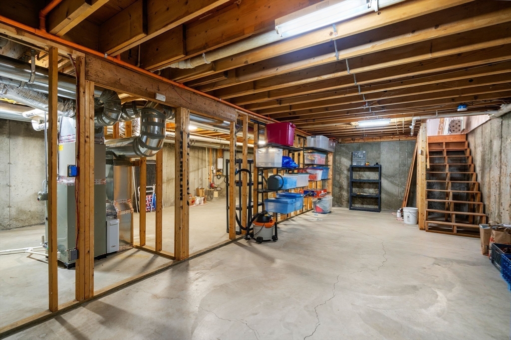 46 Deer Path, Unit 46 Hudson, MA 01749 - Photo 20 of 23 a view of an empty room with storage