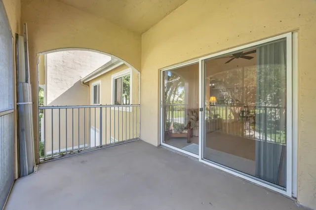 a bedroom with bed and window