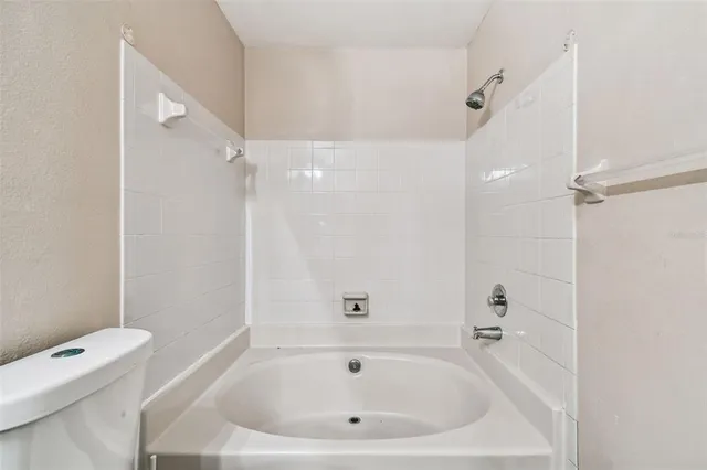 a front view of a house with outdoor space