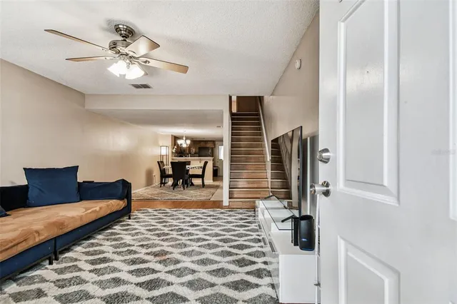 a living room with furniture and a window